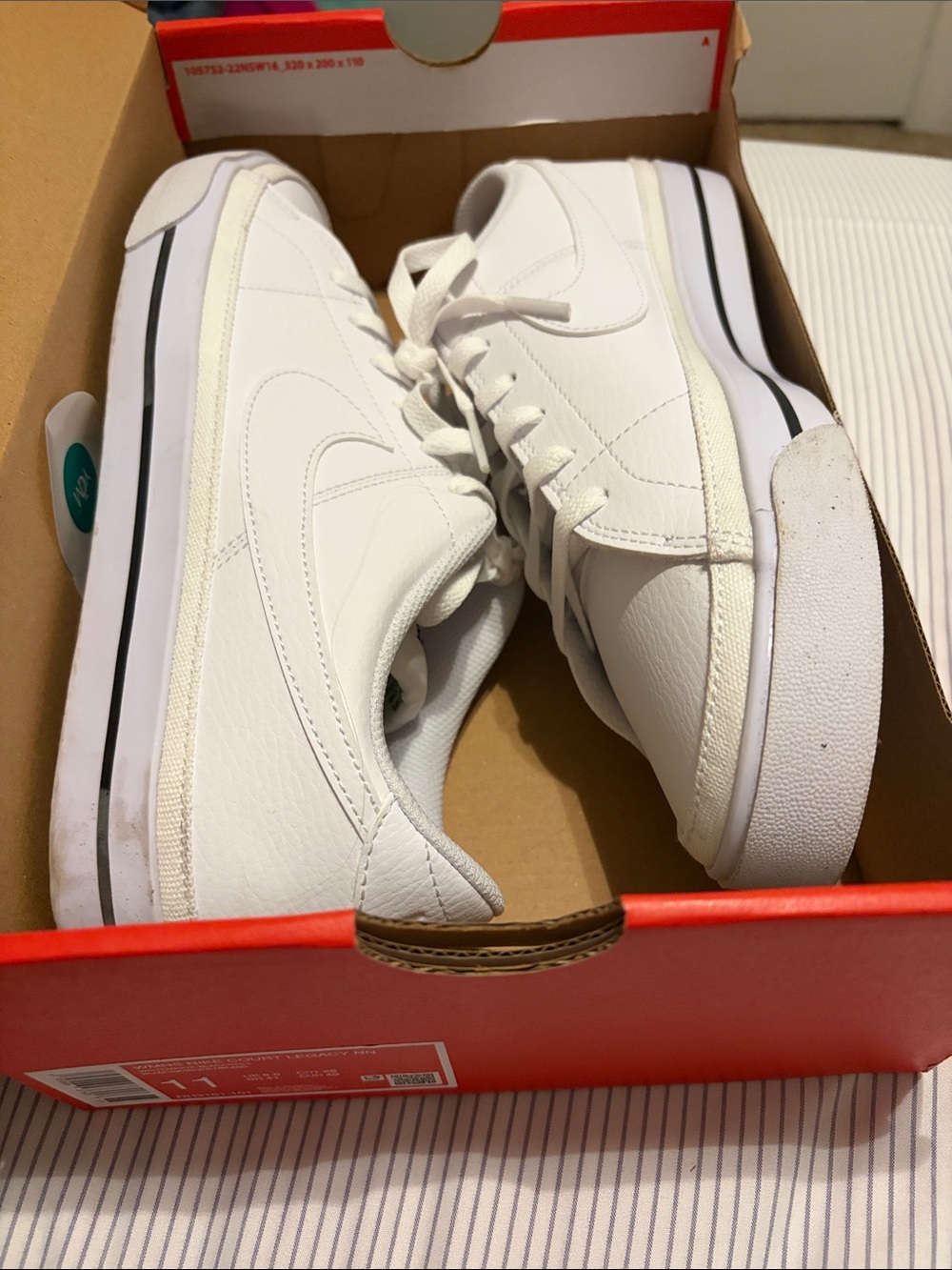 Nike White Low-Top Women's Sneakers with Black Stripe